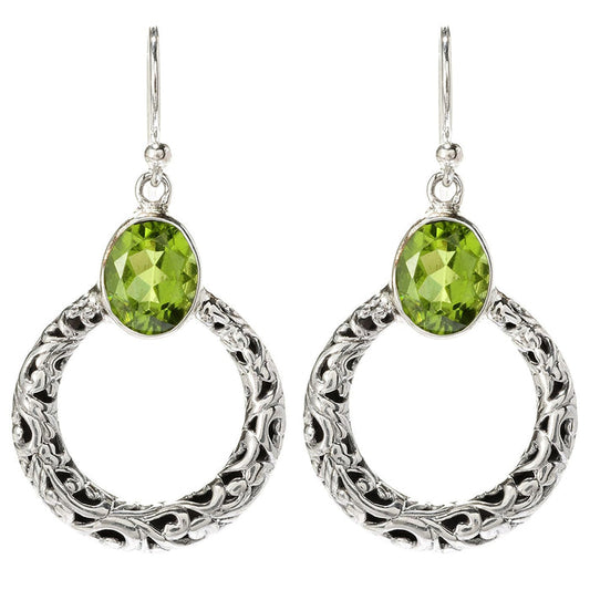 Samuel B. Sterling Silver Sacred Circle Peridot Earrings. Our Sterling Silver circle dangling earrings with peridot, handcrafted in Bali by our skilled artisans. From our signature collection, Royal Bali™ featuring designs handcrafted using sterling silver, solid 18k gold accents and genuine gemstones.