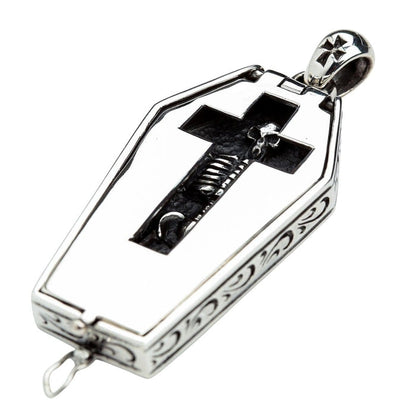 Coffin locket pendant angled view displaying ornate engraved scroll pattern on sides