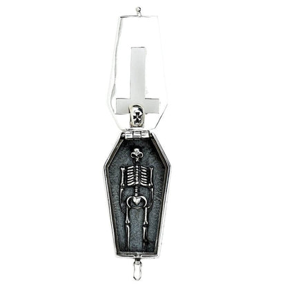 Skeleton coffin locket fully opened revealing detailed full skeleton figure inside oxidized interior