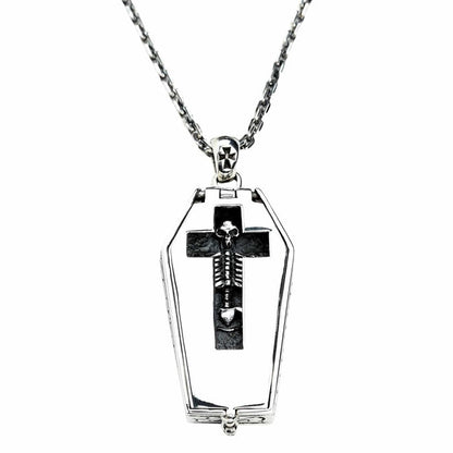 Gothic skeleton pendant displayed with sterling silver chain showing complete necklace setup
