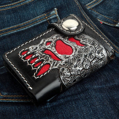 Close up detail of genuine red stingray leather inlay on the skull teeth and eyes