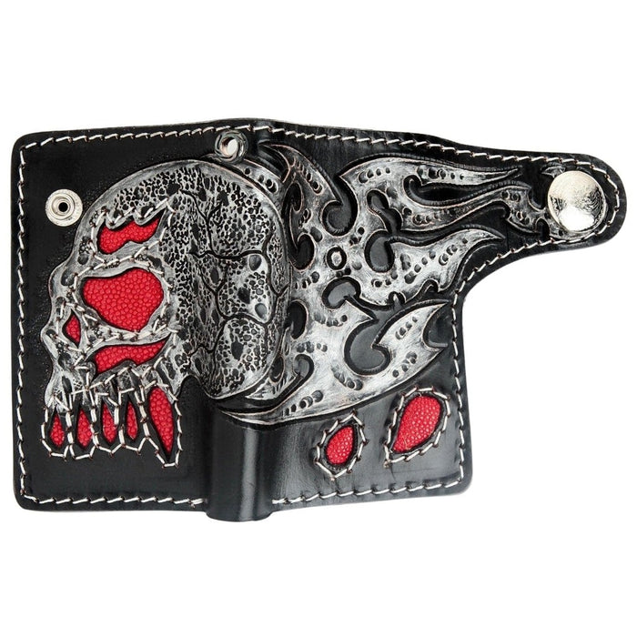 Full spread layout of the wallet showing the continuous skull and tribal flame artwork