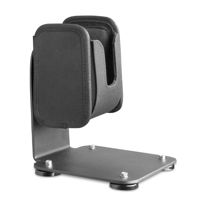 The SteadyMag™ Magnetic Mount System features a black, L-shaped metal headphone stand with padded rests, a flat base secured by four bolts, and a universal barcode scanner holder for organized and versatile storage.