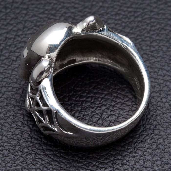 The back of the spider skull ring, showing the 925 hallmark and solid band.