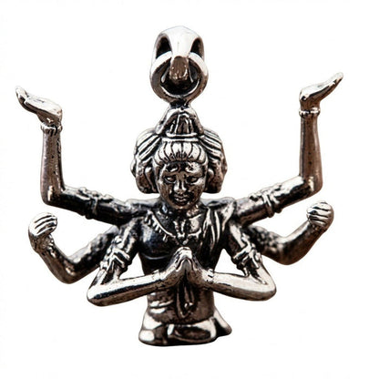 Close-up detailing the multiple raised arms and carved faces of the solid silver Hindu deity pendant.