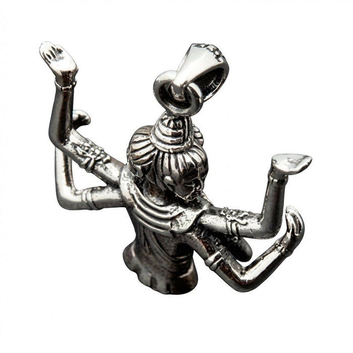 High rear angle showcasing the sturdy top bail, carved headdress, and backward-reaching arms of the silver pendant.