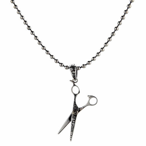 The sterling silver scissors pendant for stylists, shown hanging on a silver ball chain.