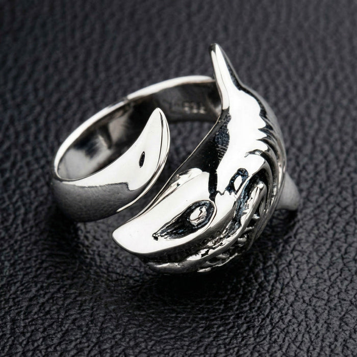 An angled view of the handmade Great White shark style ring, highlighting its three-dimensional craftsmanship.