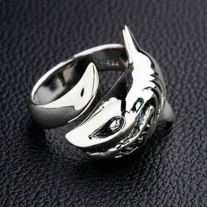 An angled view of the handmade Great White shark style ring, highlighting its three-dimensional craftsmanship.