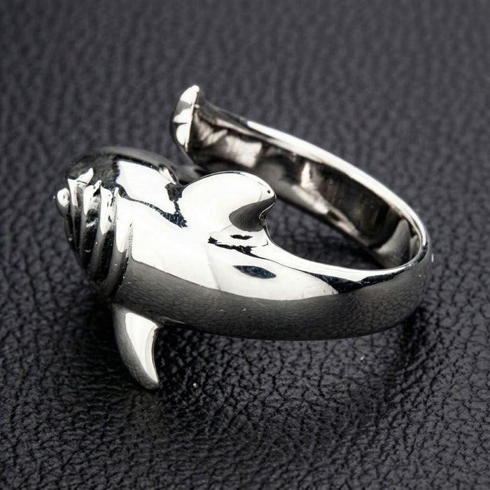 A side profile of the silver shark ring, showing the solid band and gill details.