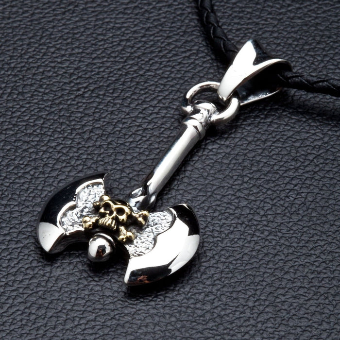 Side angle view of the solid silver Norse warrior axe pendant, showcasing its substantial thickness and quality craftsmanship.