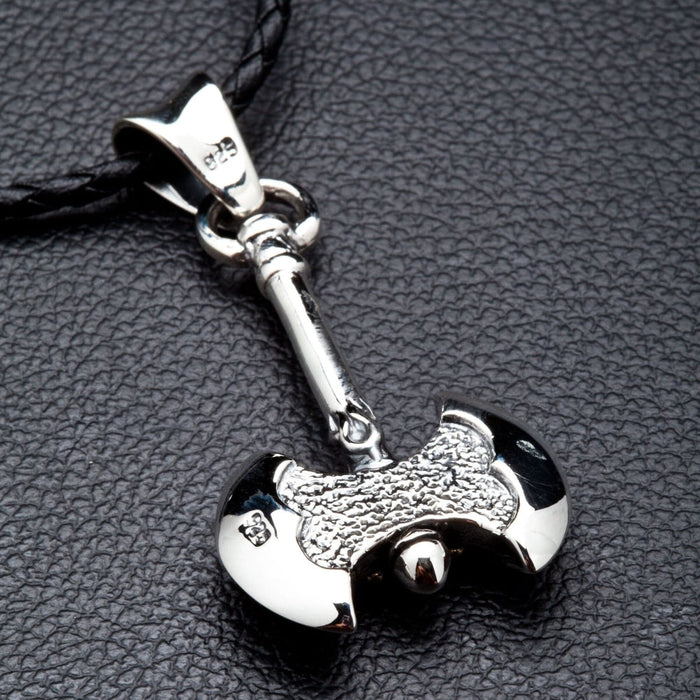 The back of the Viking axe pendant displaying the authentic .925 sterling silver hallmark stamp for quality assurance.