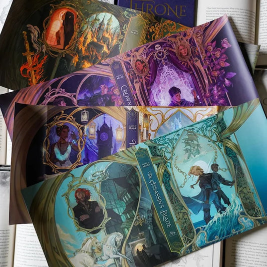 Throne of Glass dust jacket set by Sarah J. Maas featuring illustrated covers for Crown of Midnight and The Assassin's Blade fanned across open book pages