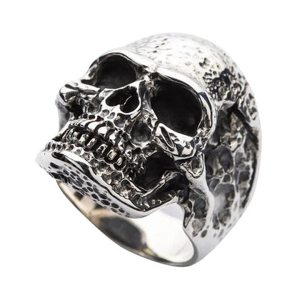 detail of the unique, molten-like texture on the rugged biker skull ring.