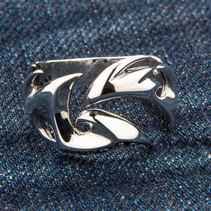 A punk rock style tribal ring, featuring a cut-out design in solid sterling silver.