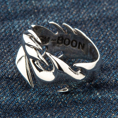 Handcrafted tribal tattoo ring, showing the fine details of the polished silver and the smooth edges