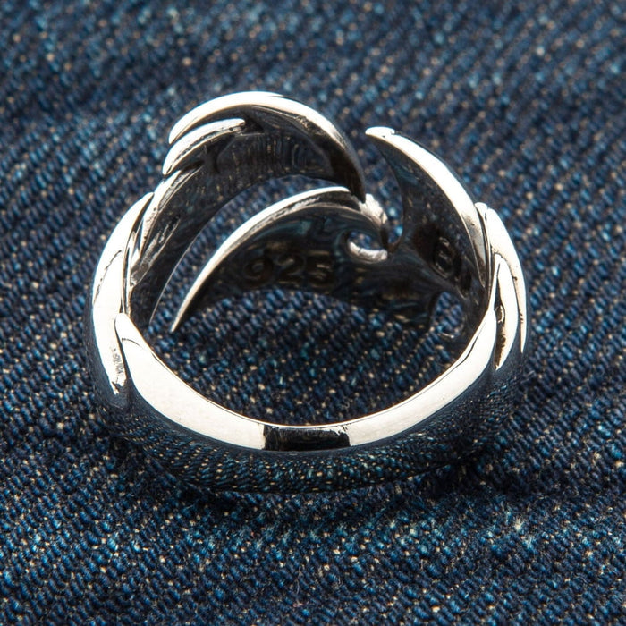 The inside view of the wide silver tribal band, showing the .925 hallmark and comfortable finish.