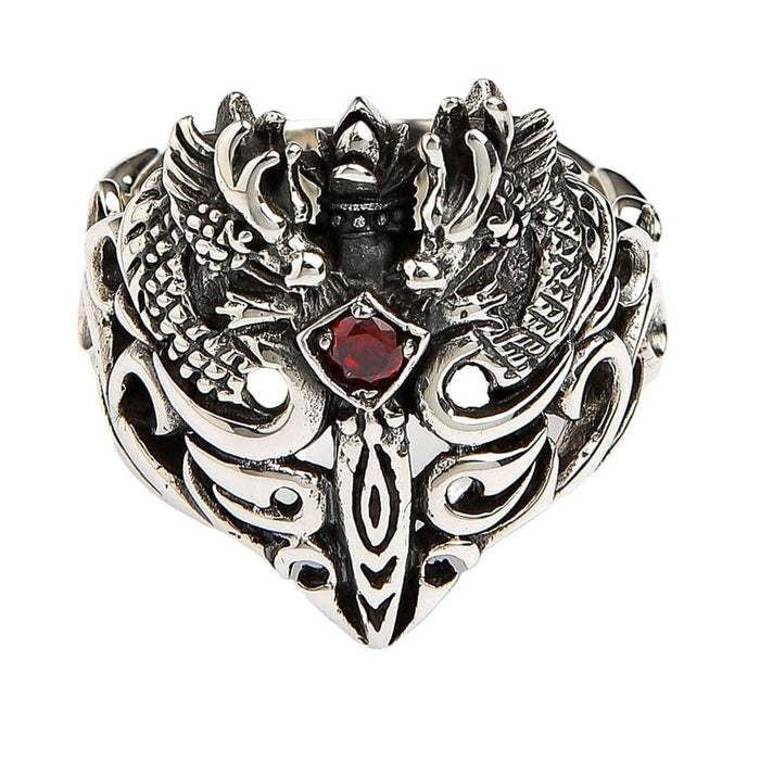 Top view of twin dragon guardian ring featuring blood-red garnet stone and symmetrical dragon design