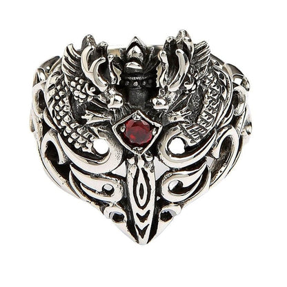 Top view of twin dragon guardian ring featuring blood-red garnet stone and symmetrical dragon design