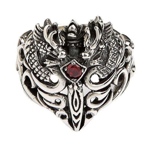Top view of twin dragon guardian ring featuring blood-red garnet stone and symmetrical dragon design