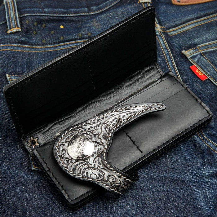 Long biker wallet trifold interior open showing ornate leather strap and multiple card slots