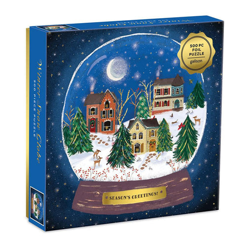 The Galison Winter Snow Globe 500 Piece Jigsaw Puzzle features snowy village scenes with houses, trees, deer, and a "Season’s Greetings!" message—ideal for fans of winter puzzles.